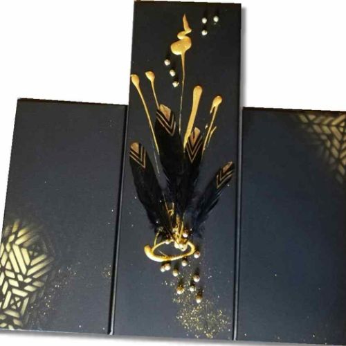 tableau noir et or ethnique plume et paillettes
